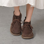 Botas de tobillo de cuero con cordones