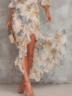 Aitana Vestido Maxi de Gasa con Estampado Floral, Cuello Alto y Bajo Asimétrico Beige