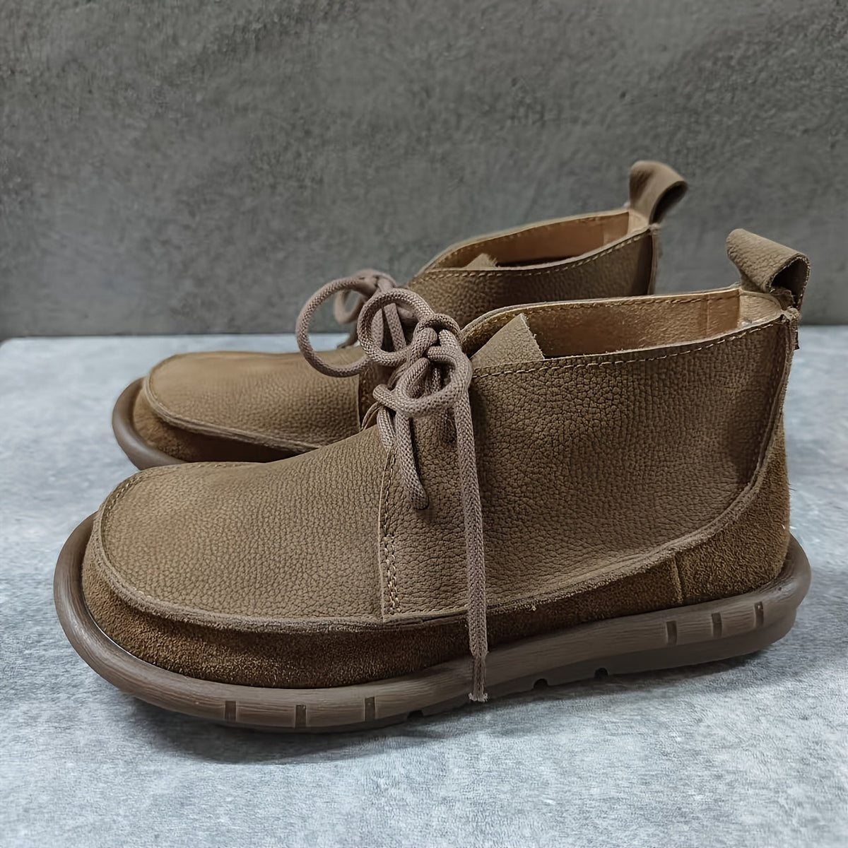 Botas de tobillo de cuero con cordones